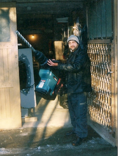 Mockup of a perforator - a puncher, compared to the size of a person