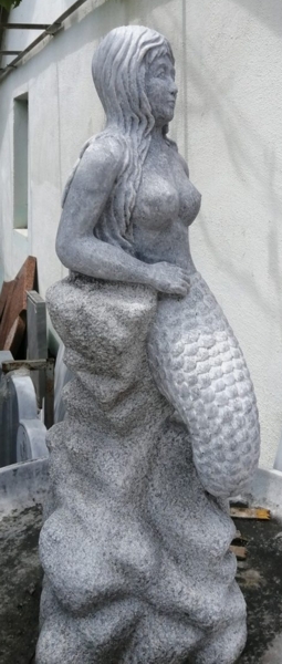 Gray marble mermaid figure, side view
