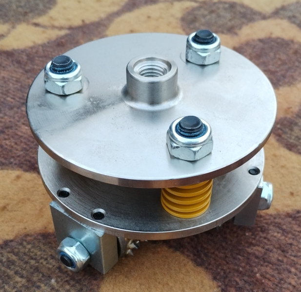 Large angle grinder bushing with three heads, view of the M14 attachment