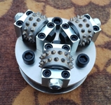 Large bushing for angle grinder with three heads