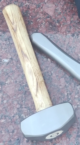 Hand hammer with an oval eye - real photo of the tools