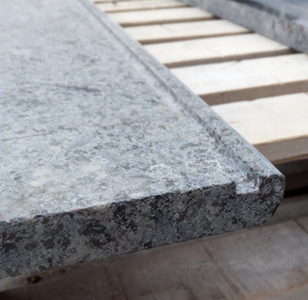 A 2 cm thick granite window sill drainage channel made with this disc