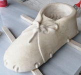 Making a leather tservul from Vratchan stone, carved to be used as a pot